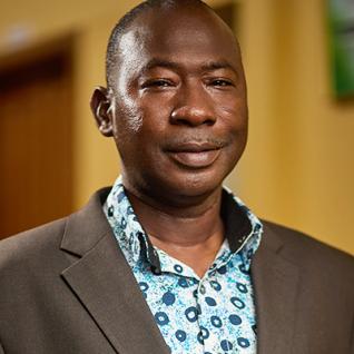 DR. AWOLU ADAM